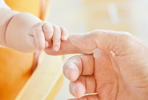 Do fathers have the right to take time off from work to attend the birth of their children?